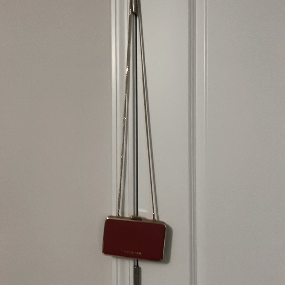 Michael Kors Crossbody clutch red with gold trim and chain strap